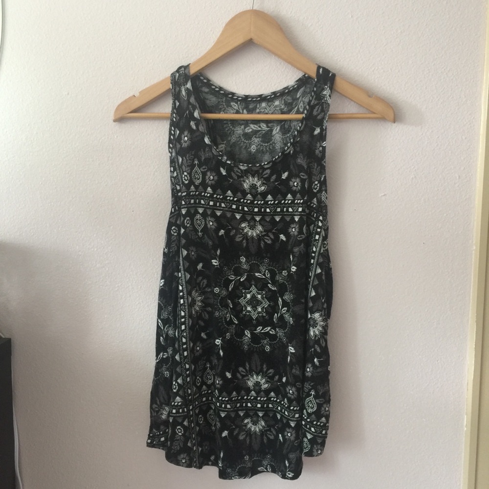 black muscle tee with flower designs